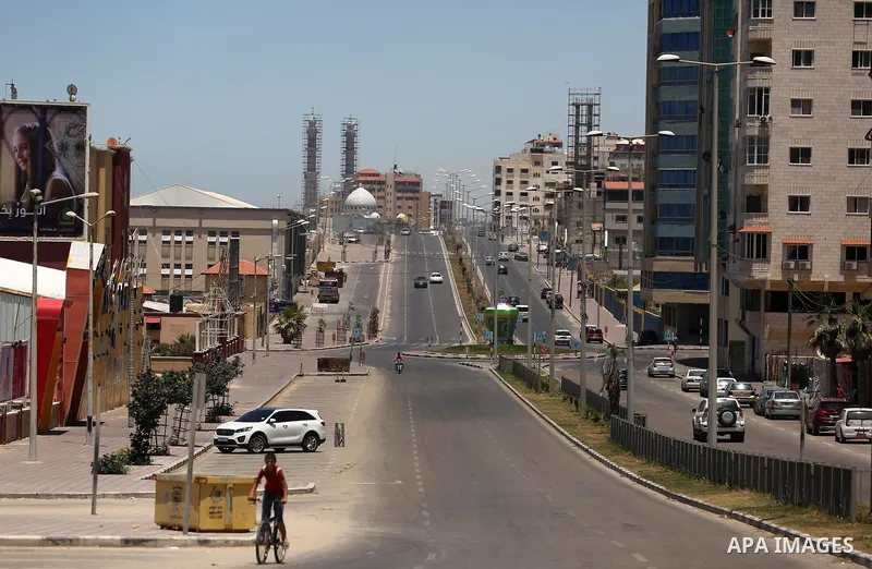 A picture taken on June 7, 2017 shows a general view of the Qatar-funded of Harun al-Rashid street which runs parallel to the beach in Gaza City. Photo by Ashraf Amra