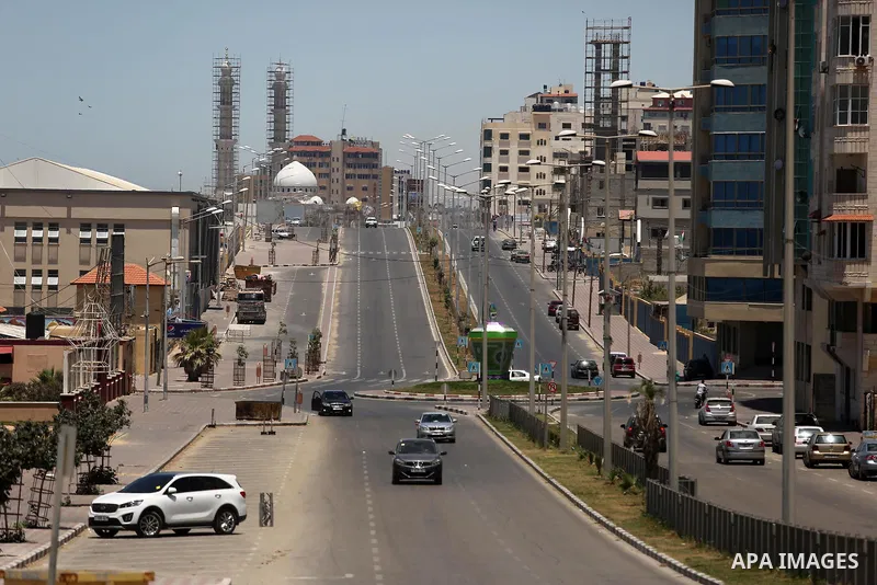 A picture taken on June 7, 2017 shows a general view of the Qatar-funded of Harun al-Rashid street which runs parallel to the beach in Gaza City. Photo by Ashraf Amra