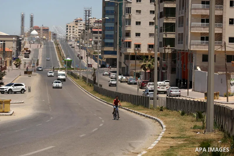 A picture taken on June 7, 2017 shows a general view of the Qatar-funded of Harun al-Rashid street which runs parallel to the beach in Gaza City. Photo by Ashraf Amra