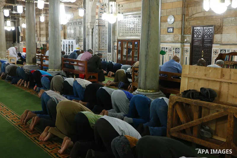 Egyptian worshipers perform take part in an evening prayer "Taraweeh", at the Sayeda al-Zeinab mosque, in Cairo on June 7, 2017. Ramadan is sacred to Muslims because it is during that month that tradition says the Koran...