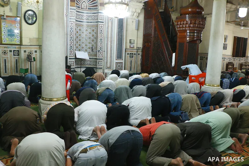 Egyptian worshipers perform take part in an evening prayer "Taraweeh", at the Sayeda al-Zeinab mosque, in Cairo on June 7, 2017. Ramadan is sacred to Muslims because it is during that month that tradition says the Koran...