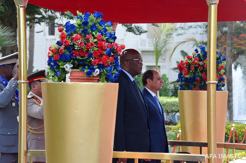 Egyptian President Abdel Fattah al-Sisi and President of Burkina Faso, Roch Marc Christian Kabore review the honor guards in Cairo, Egypt, on June 07, 2017. Photo by Egyptian President Office
