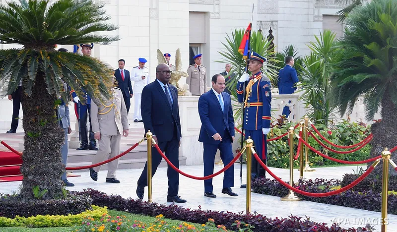 Egyptian President Abdel Fattah al-Sisi walks alongside with President of Burkina Faso, Roch Marc Christian Kabore in Cairo, Egypt, on June 07, 2017. Photo by Egyptian President Office
