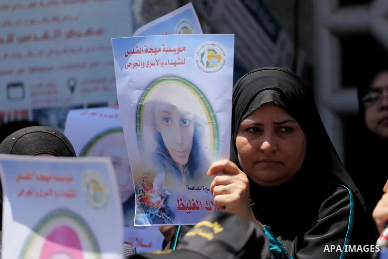 Palestinian women take part in a protest to show solidarity with Palestinian female prisoners held in Israeli jails, in Gaza city on June 08, 2017. Photo by Mohammed Asad