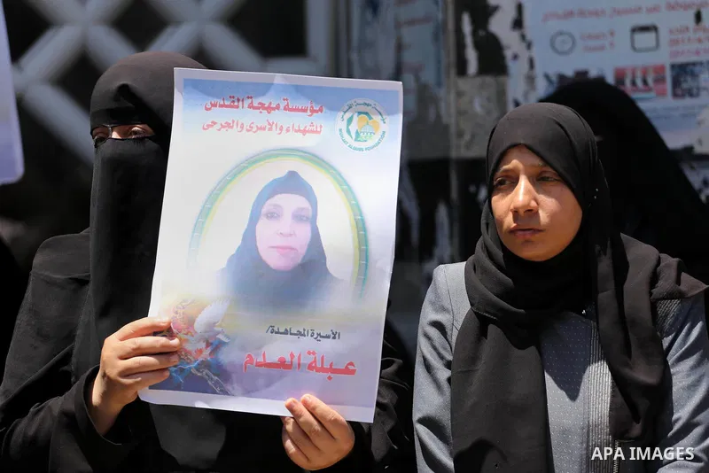 Palestinian women take part in a protest to show solidarity with Palestinian female prisoners held in Israeli jails, in Gaza city on June 08, 2017. Photo by Mohammed Asad