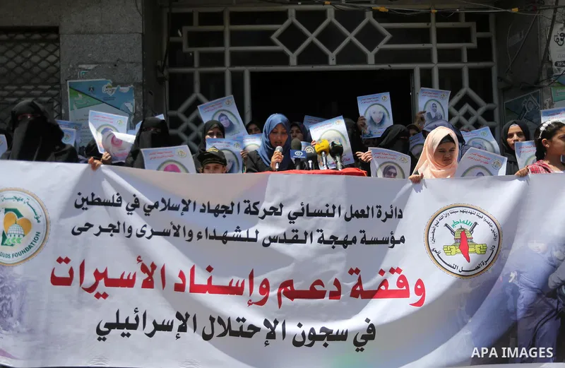 Palestinian women take part in a protest to show solidarity with Palestinian female prisoners held in Israeli jails, in Gaza city on June 08, 2017. Photo by Mohammed Asad