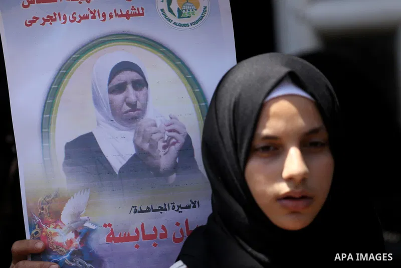 Palestinian women take part in a protest to show solidarity with Palestinian female prisoners held in Israeli jails, in Gaza city on June 08, 2017. Photo by Mohammed Asad