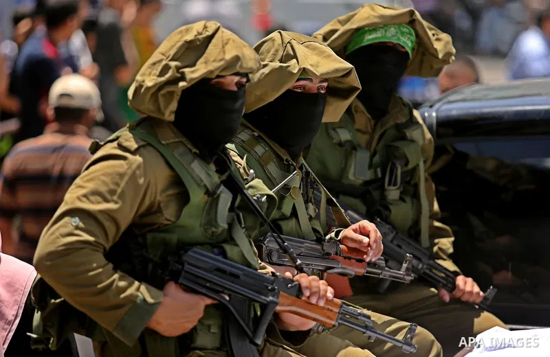 Members of the Ezzedine al-Qassam Brigades, the military wing of the Palestinian Islamist movement Hamas, attend the funeral of their comrade Ibrahim Abu Al-Naja in Rafah, southern Gaza Strip June 8, 2017. Photo by Ashra...