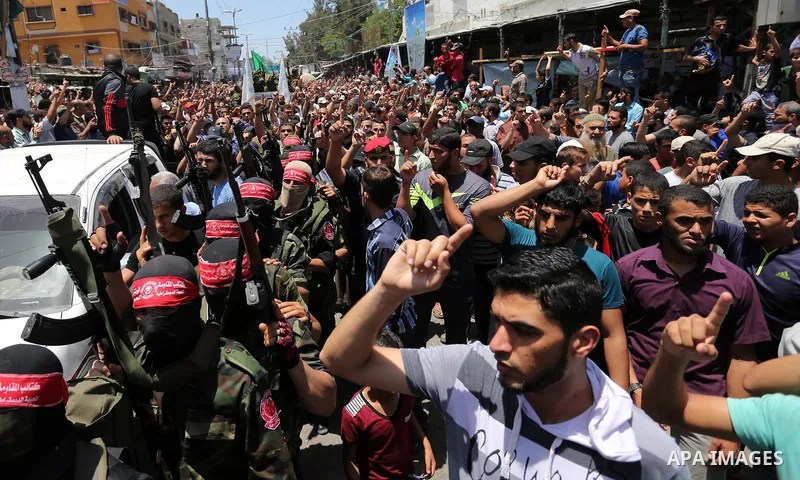 Palestinians attend the funeral of a member the Ezzedine al-Qassam Brigades, the military wing of the Palestinian Islamist movement Hamas of Ibrahim Abu Al-Naja, in Rafah, southern Gaza Strip June 8, 2017. Photo by Ashra...