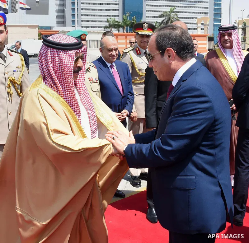 Egyptian President Abdel Fattah Sisi bids farewell to King of Bahrain Hamad bin Issa al-Khalifa at Cairo International Airport in Cairo on June 9, 2017. Photo by Egyptian President Office