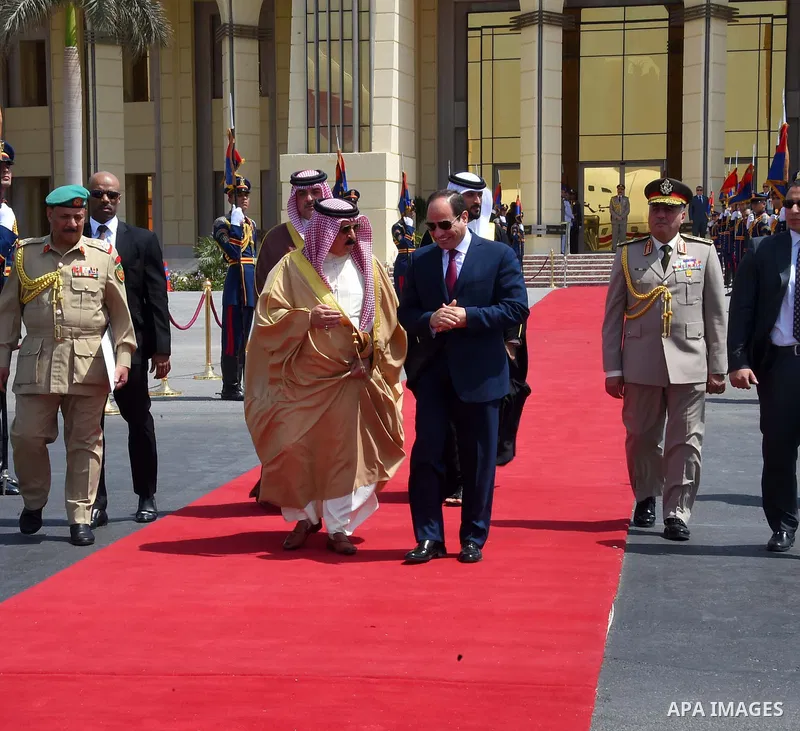 Egyptian President Abdel Fattah Sisi bids farewell to King of Bahrain Hamad bin Issa al-Khalifa at Cairo International Airport in Cairo on June 9, 2017. Photo by Egyptian President Office