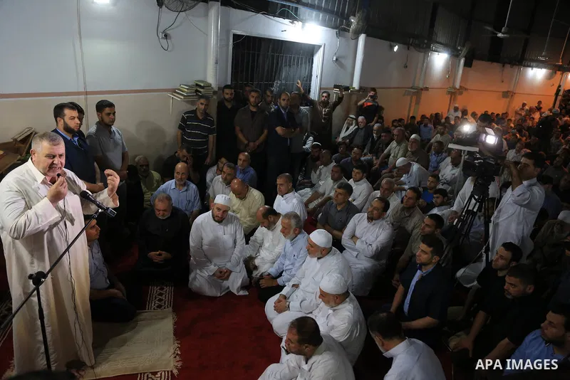 Palestinian mourners pray over the body of Aaed Goma, 35, who was killed by Israeli gunfire during clashes, in Jabalia refugee camp in the northern Gaza strip on June 09, 2017. Photo by Dawod Abo Elkass