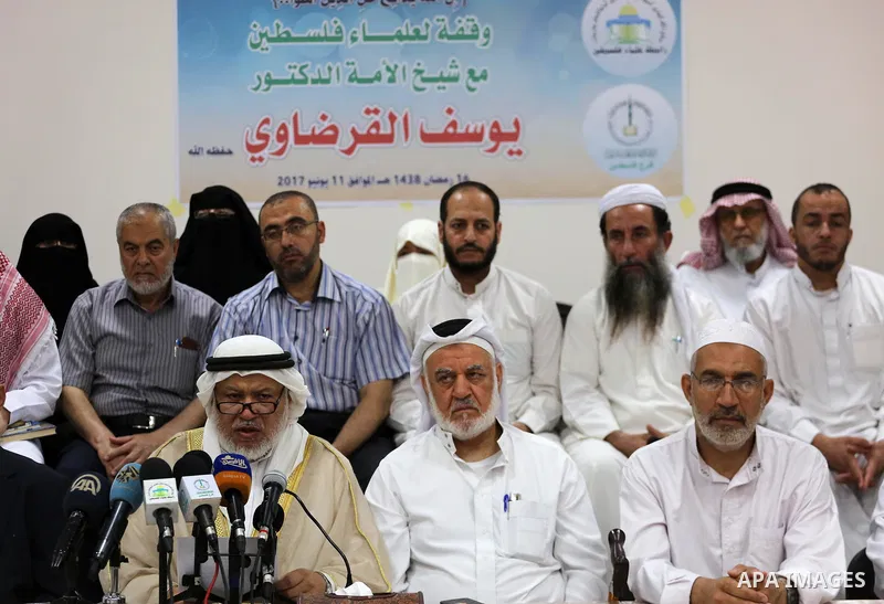 Marwan Abu Ras, a head of the Palestine Scholars Association, speaks during a press conference to show solidarity with Sheikh Yusuf al-Qaradawi in Gaza city on June 11, 2017. The Muslim World League announced the termina...