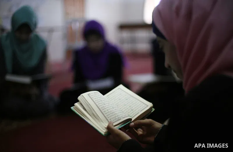Palestinian girls attend a lesson of Koran, Islam's holiest book on the Muslim holy fasting month of Ramadan, at Dar Al Ketab and Sunna in Gaza city, on June 12, 2017. Ramadan is sacred to Muslims because it is during th...