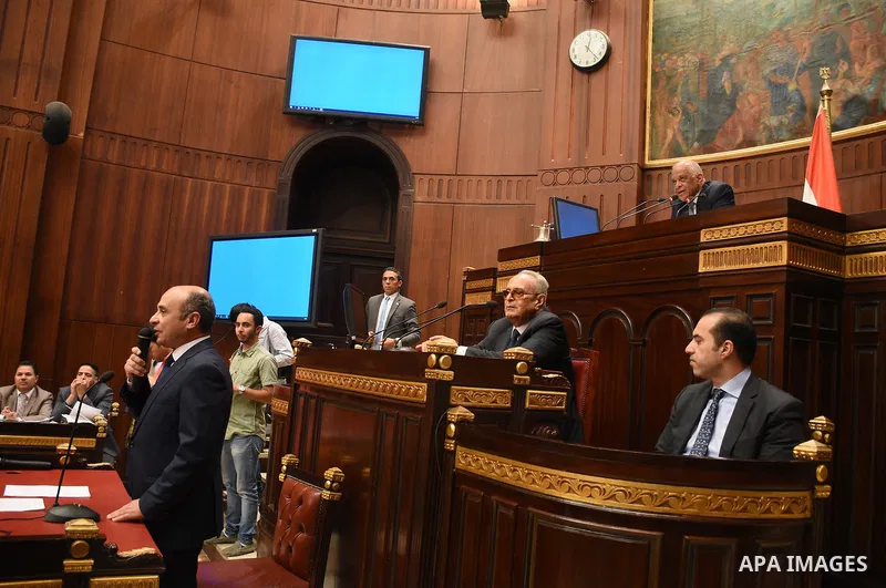 Members of legislative committee in Egypt's parliament attend a meeting to discuss a government agreement to hand over two Red Sea islands Tiran and Sanafir to Saudi Arabia, in Cairo, Egypt, on June 12, 2017. Photo by St...