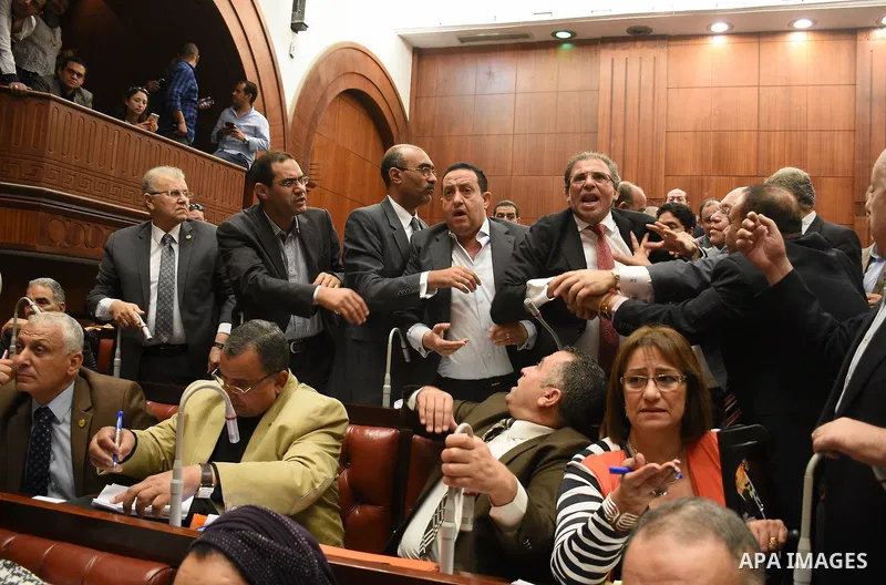 Members of legislative committee in Egypt's parliament attend a meeting to discuss a government agreement to hand over two Red Sea islands Tiran and Sanafir to Saudi Arabia, in Cairo, Egypt, on June 12, 2017. Photo by St...