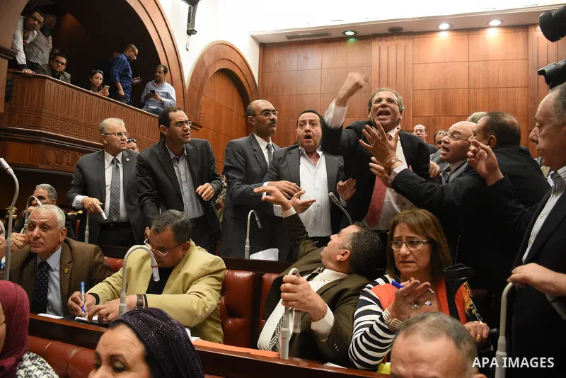 Members of legislative committee in Egypt's parliament attend a meeting to discuss a government agreement to hand over two Red Sea islands Tiran and Sanafir to Saudi Arabia, in Cairo, Egypt, on June 12, 2017. Photo by St...