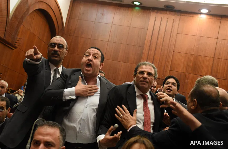 Members of legislative committee in Egypt's parliament attend a meeting to discuss a government agreement to hand over two Red Sea islands Tiran and Sanafir to Saudi Arabia, in Cairo, Egypt, on June 12, 2017. Photo by St...