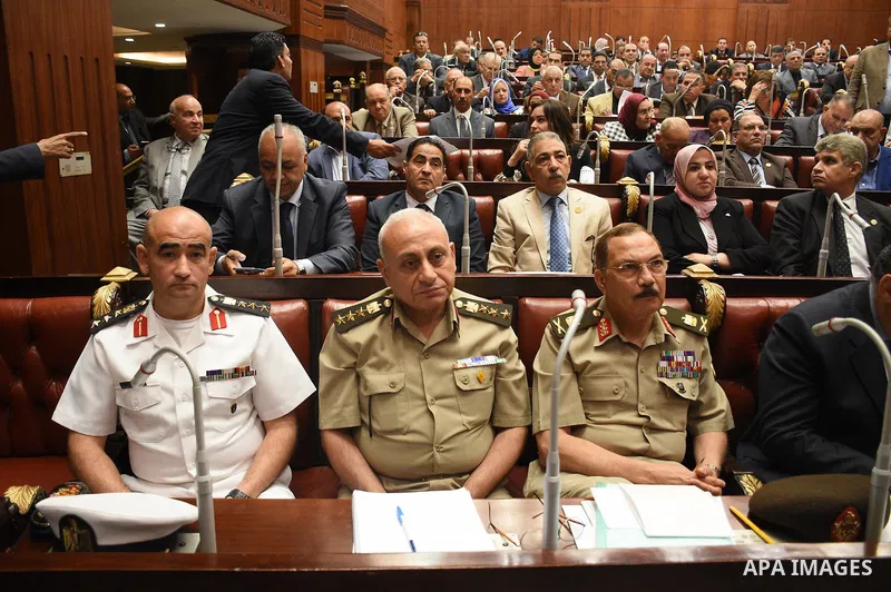 Members of legislative committee in Egypt's parliament attend a meeting to discuss a government agreement to hand over two Red Sea islands Tiran and Sanafir to Saudi Arabia, in Cairo, Egypt, on June 12, 2017. Photo by St...