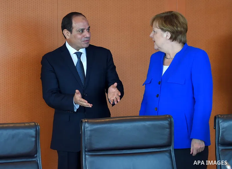German Chancellor Angela Merkel greets Egyptian President Abdel Fattah al-Sisi as he arrives at the chancellory on the sidelines of a two-day G20 Africa partnership investment conference in Berlin on June 12, 2017. Photo...