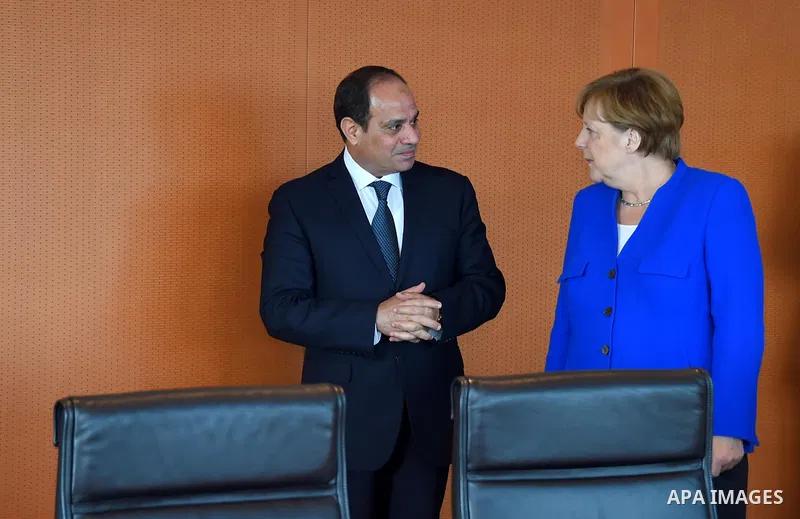 German Chancellor Angela Merkel greets Egyptian President Abdel Fattah al-Sisi as he arrives at the chancellory on the sidelines of a two-day G20 Africa partnership investment conference in Berlin on June 12, 2017. Photo...