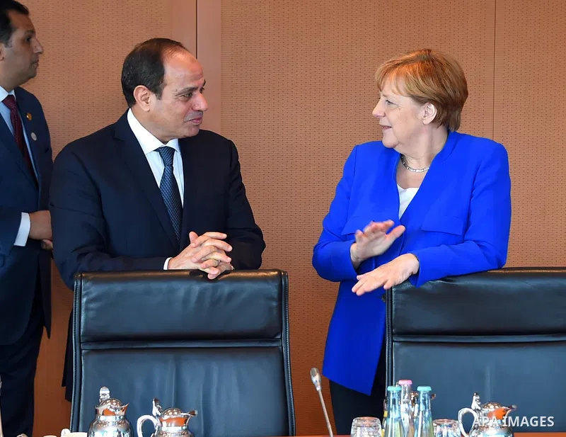 German Chancellor Angela Merkel greets Egyptian President Abdel Fattah al-Sisi as he arrives at the chancellory on the sidelines of a two-day G20 Africa partnership investment conference in Berlin on June 12, 2017. Photo...