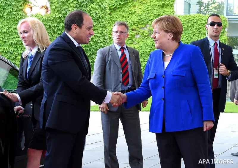 German Chancellor Angela Merkel greets Egyptian President Abdel Fattah al-Sisi as he arrives at the chancellory on the sidelines of a two-day G20 Africa partnership investment conference in Berlin on June 12, 2017. Photo...