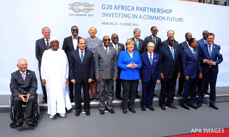 (1st row L-R) Malian President Ibrahim Boubacar Keita,Egyptian President Abdel Fattah al-Sisi, Guinean President and Chairman of the African Union Alpha Conde, German Chancellor Angela Merkel, Tunesian President Beji Cai...