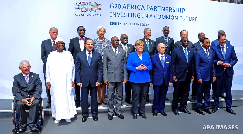 (1st row L-R) Malian President Ibrahim Boubacar Keita,Egyptian President Abdel Fattah al-Sisi, Guinean President and Chairman of the African Union Alpha Conde, German Chancellor Angela Merkel, Tunesian President Beji Cai...