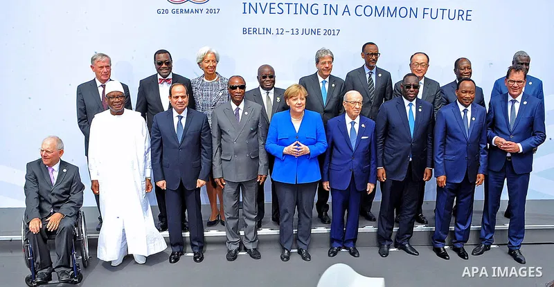 (1st row L-R) Malian President Ibrahim Boubacar Keita,Egyptian President Abdel Fattah al-Sisi, Guinean President and Chairman of the African Union Alpha Conde, German Chancellor Angela Merkel, Tunesian President Beji Cai...