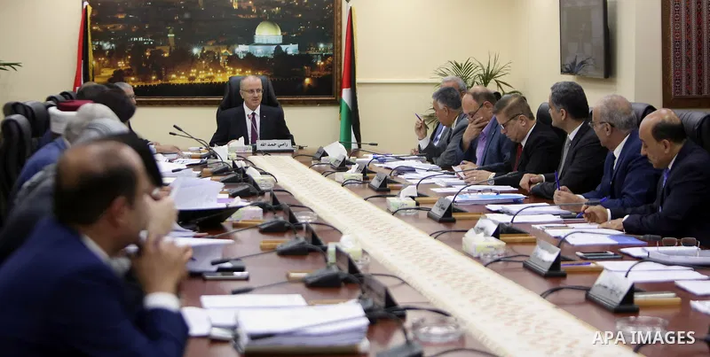 Palestinian Prime Minister Rami Hamdallah chairs a meeting of council of Ministers in the West Bank city of Ramallah, on June 13, 2017. Photo by Prime Minister Office
