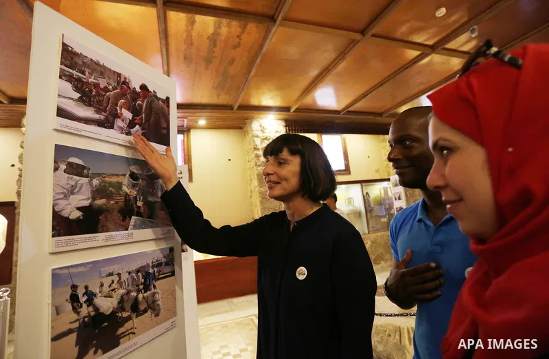 Palestinians participate in a photo gallery organized by Red cross (ICRC) on the occasion of over 50 years of its presence in the occupied Palestinian territories, in Gaza city on June 13, 2017. Photo by Ashraf Amra