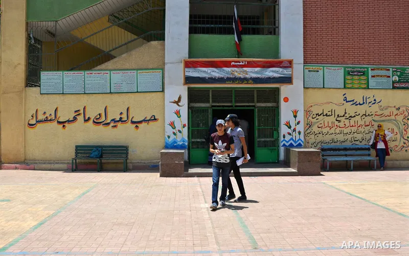 Egyptian students leave their school following a high school exams in Cairo, Egypt, on June 13, 2017. Photo by Amr Sayed