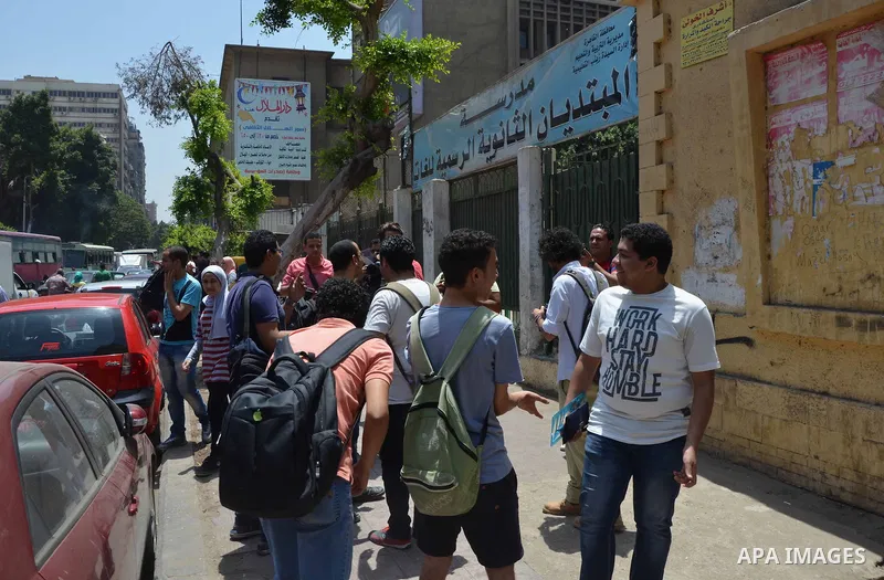 Egyptian students leave their school following a high school exams in Cairo, Egypt, on June 13, 2017. Photo by Amr Sayed