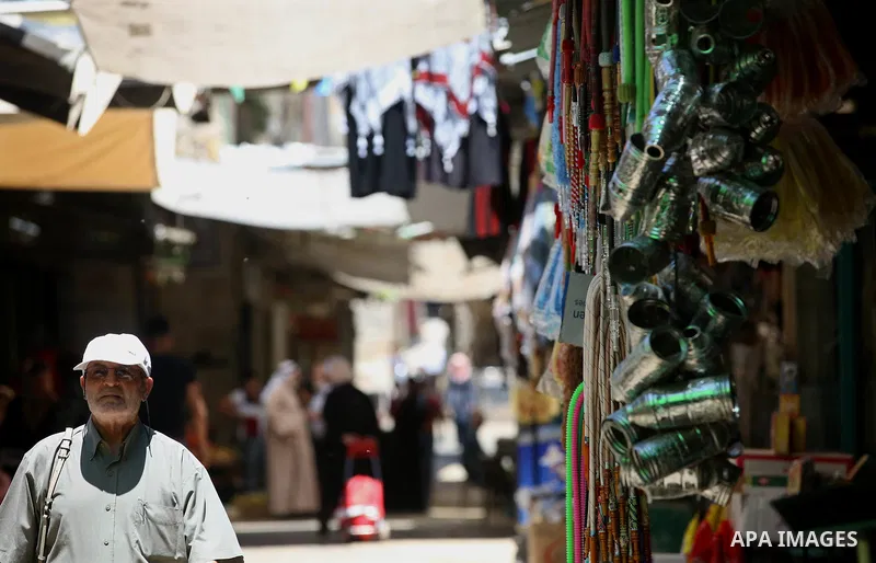 Palestinians shop at a market on the Muslim holy fasting month of Ramadan in the Old City of the West Bank town of Nablus, on June 13, 2017. Ramadan is sacred to Muslims because it is during that month that tradition say...