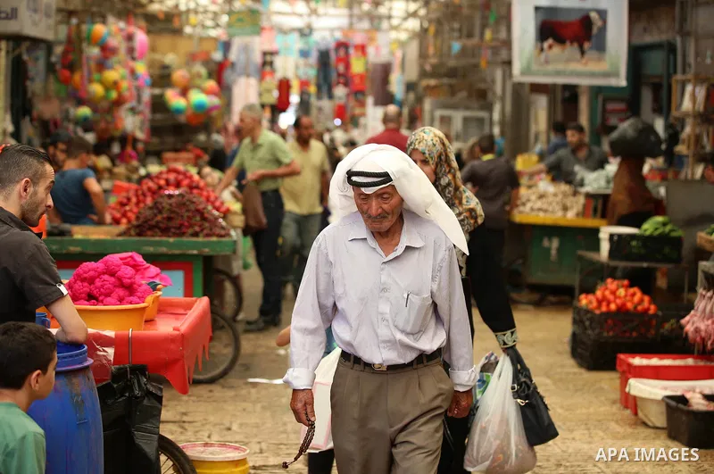 Palestinians shop at a market on the Muslim holy fasting month of Ramadan in the Old City of the West Bank town of Nablus, on June 13, 2017. Ramadan is sacred to Muslims because it is during that month that tradition say...