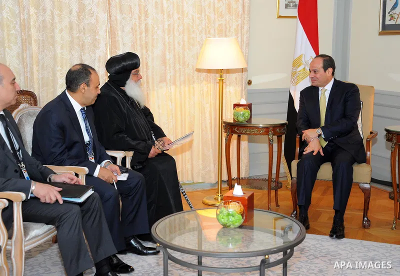 Egyptian President Abdel Fattah al-Sisi meets with Leader of the Coptic Orthodox church in Germany, Bishop Anba Damian in Berlin on June 13, 2017. Photo by Egyptian President Office