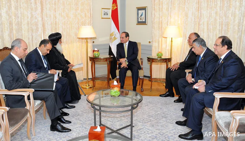 Egyptian President Abdel Fattah al-Sisi meets with Leader of the Coptic Orthodox church in Germany, Bishop Anba Damian in Berlin on June 13, 2017. Photo by Egyptian President Office