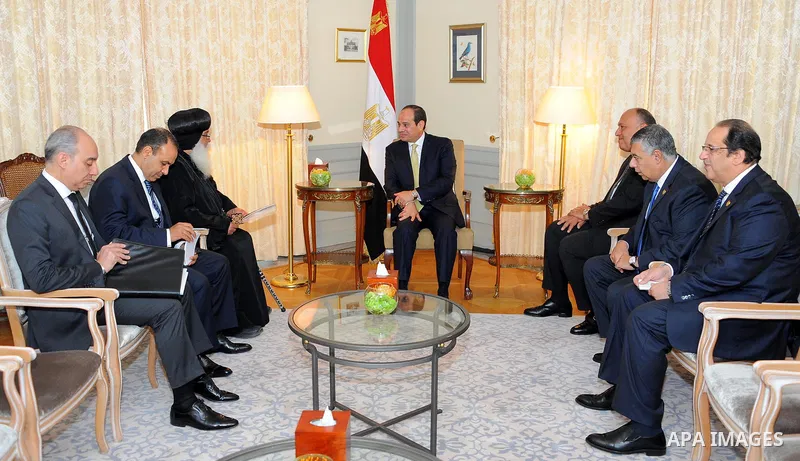 Egyptian President Abdel Fattah al-Sisi meets with Leader of the Coptic Orthodox church in Germany, Bishop Anba Damian in Berlin on June 13, 2017. Photo by Egyptian President Office
