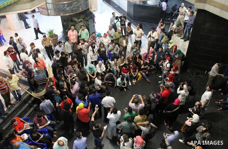 Dozens of Egyptian journalists attend a demonstration at the Syndicate of Journalists in Cairo on June 13, 2017 after a controversial agreement for Cairo to hand over two Red Sea islands to Saudi Arabia passed an Egyptia...