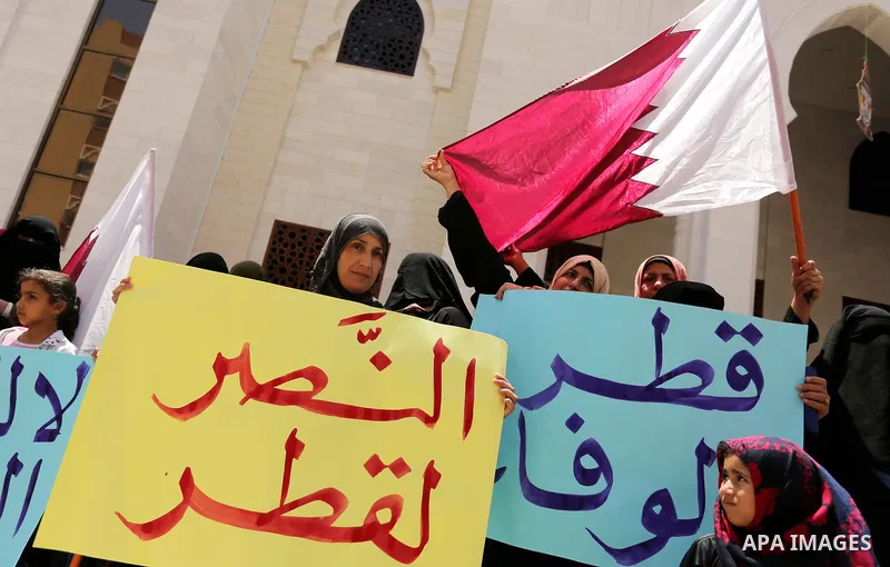 Palestinian women take part in a rally in support of Qatar, inside Qatari-funded construction project 'Hamad City', in Khan Younis in the southern Gaza Strip, June 14, 2017. Photo by Ashraf Amra