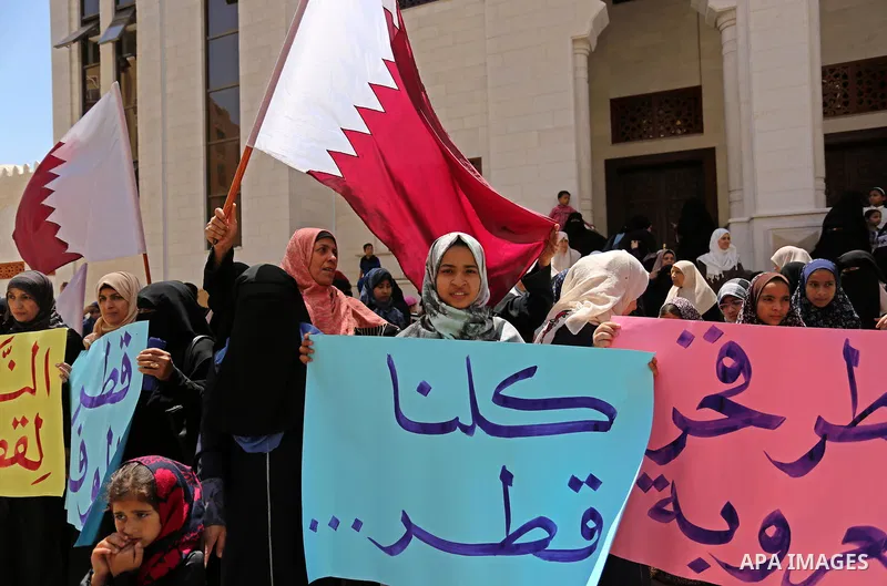 Palestinian women take part in a rally in support of Qatar, inside Qatari-funded construction project 'Hamad City', in Khan Younis in the southern Gaza Strip, June 14, 2017. Photo by Ashraf Amra