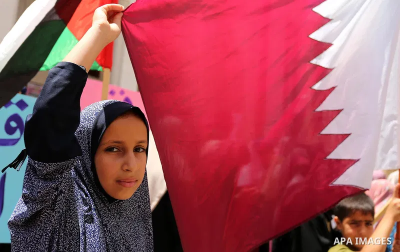 Palestinian women take part in a rally in support of Qatar, inside Qatari-funded construction project 'Hamad City', in Khan Younis in the southern Gaza Strip, June 14, 2017. Photo by Ashraf Amra
