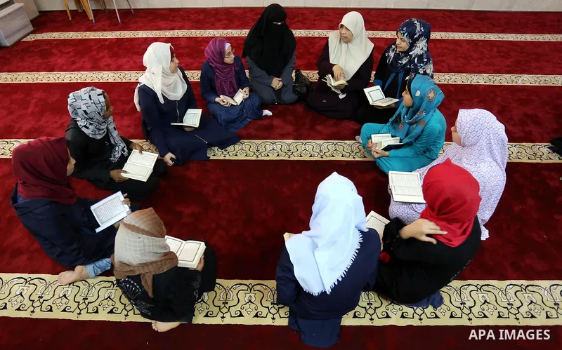 Palestinian girls attend a lesson of Koran, Islam's holiest book on the Muslim holy fasting month of Ramadan, at Hamad Mosque in Khan Younis in the southern Gaza Strip, June 14, 2017. Ramadan is sacred to Muslims because...