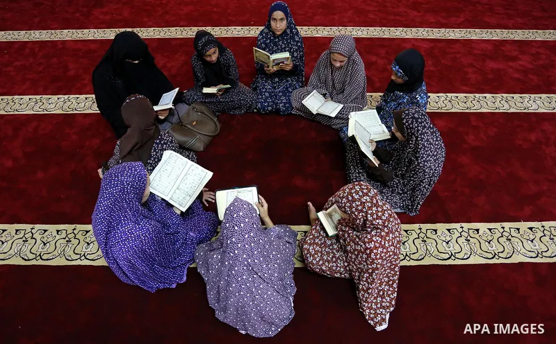 Palestinian girls attend a lesson of Koran, Islam's holiest book on the Muslim holy fasting month of Ramadan, at Hamad Mosque in Khan Younis in the southern Gaza Strip, June 14, 2017. Ramadan is sacred to Muslims because...