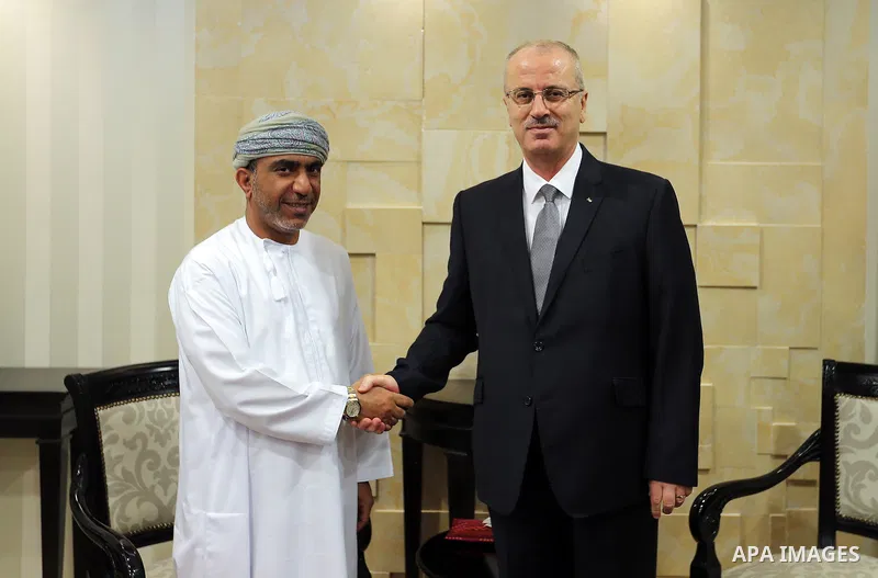 Palestinian Prime Minister Rami Hamdallah meets with head of the Omani Football union, Salem Al Wahaibi, in the West Bank city of Ramallah on June 14, 2017. Photo by Prime Minister Office
