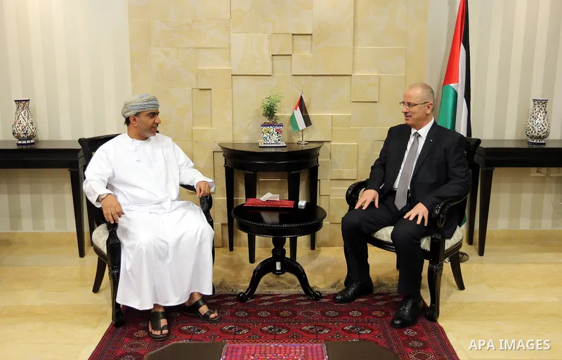 Palestinian Prime Minister Rami Hamdallah meets with head of the Omani Football union, Salem Al Wahaibi, in the West Bank city of Ramallah on June 14, 2017. Photo by Prime Minister Office