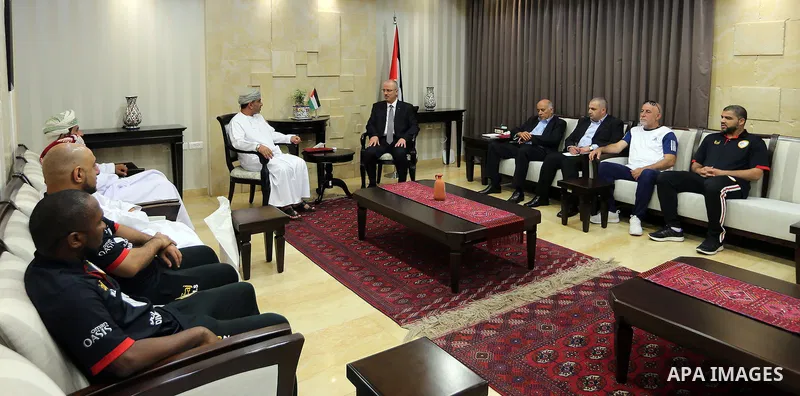 Palestinian Prime Minister Rami Hamdallah meets with head of the Omani Football union, Salem Al Wahaibi, in the West Bank city of Ramallah on June 14, 2017. Photo by Prime Minister Office