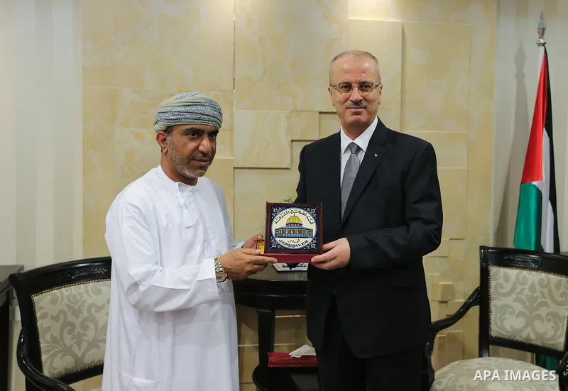 Palestinian Prime Minister Rami Hamdallah meets with head of the Omani Football union, Salem Al Wahaibi, in the West Bank city of Ramallah on June 14, 2017. Photo by Prime Minister Office