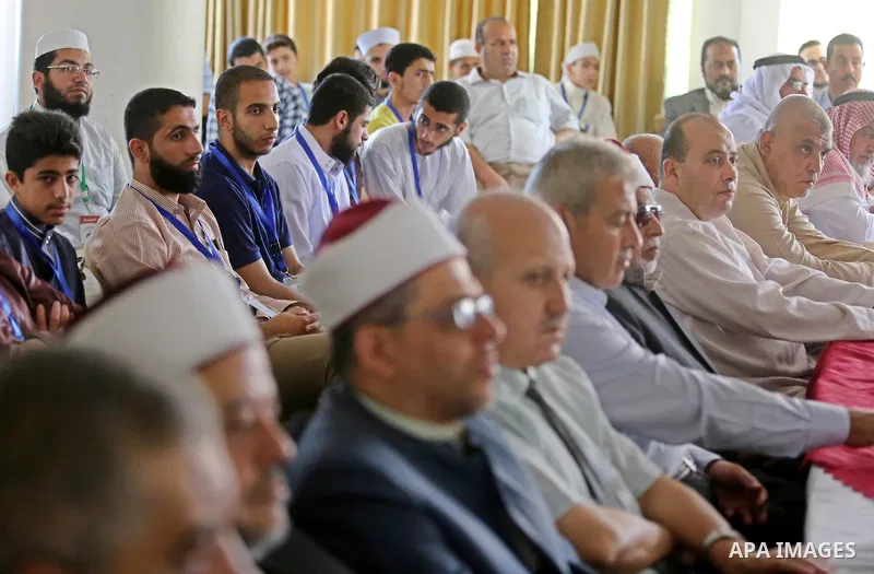 Palestinians attend the ceremony of Conservation of the holy Koran competition "Jerusalem Prize", in Gaza city on June 15, 2017. Photo by Ashraf Amra